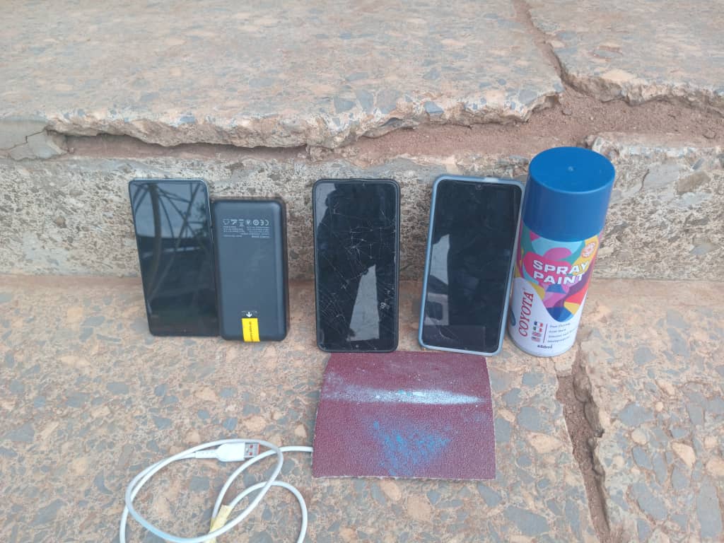 Ogun Police Arrest Woman As Suspects Repaint Allegedly Stolen Mini Bus In Bush