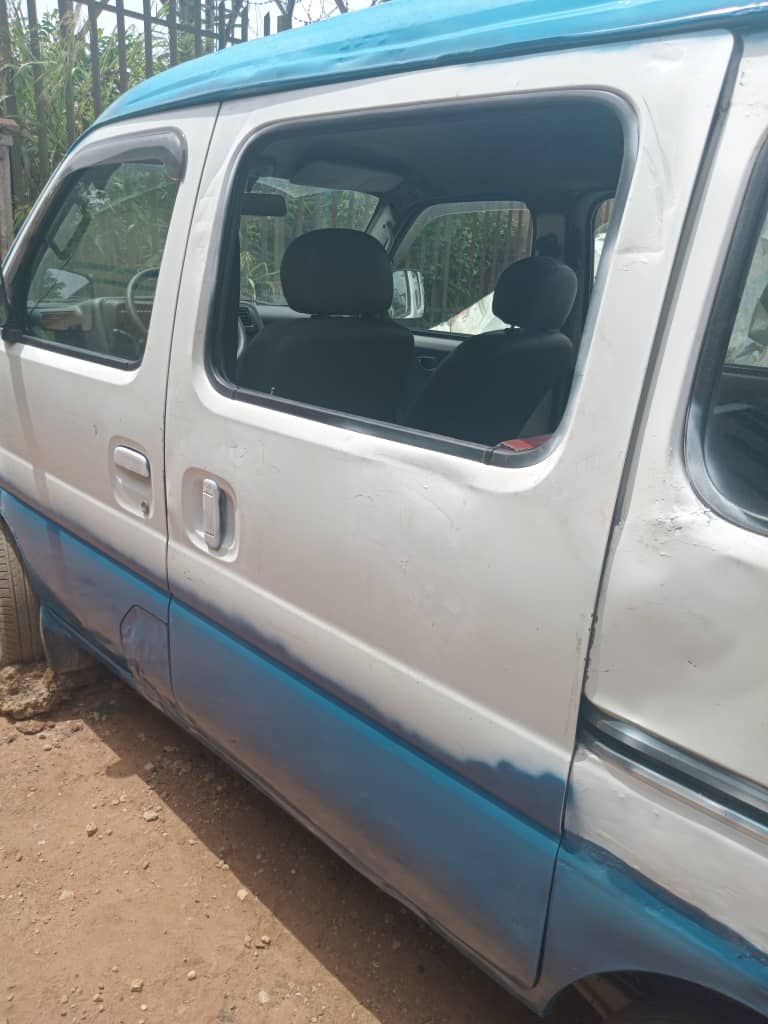 Ogun Police Arrest Woman As Suspects Repaint Allegedly Stolen Mini Bus In Bush