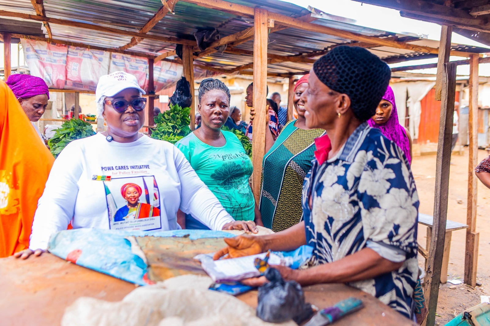 POWA President surprises Abuja barracks traders with grants, relief materials
